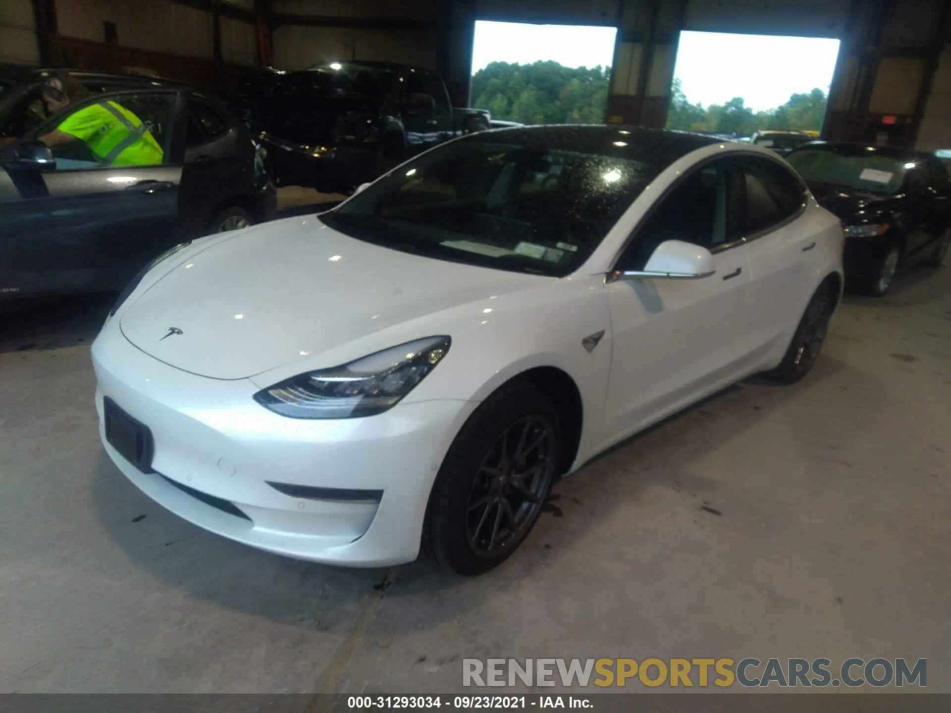 2 fotografías del automóvil dañado 5YJ3E1EA4LF706349 TESLA MODEL 3 2020