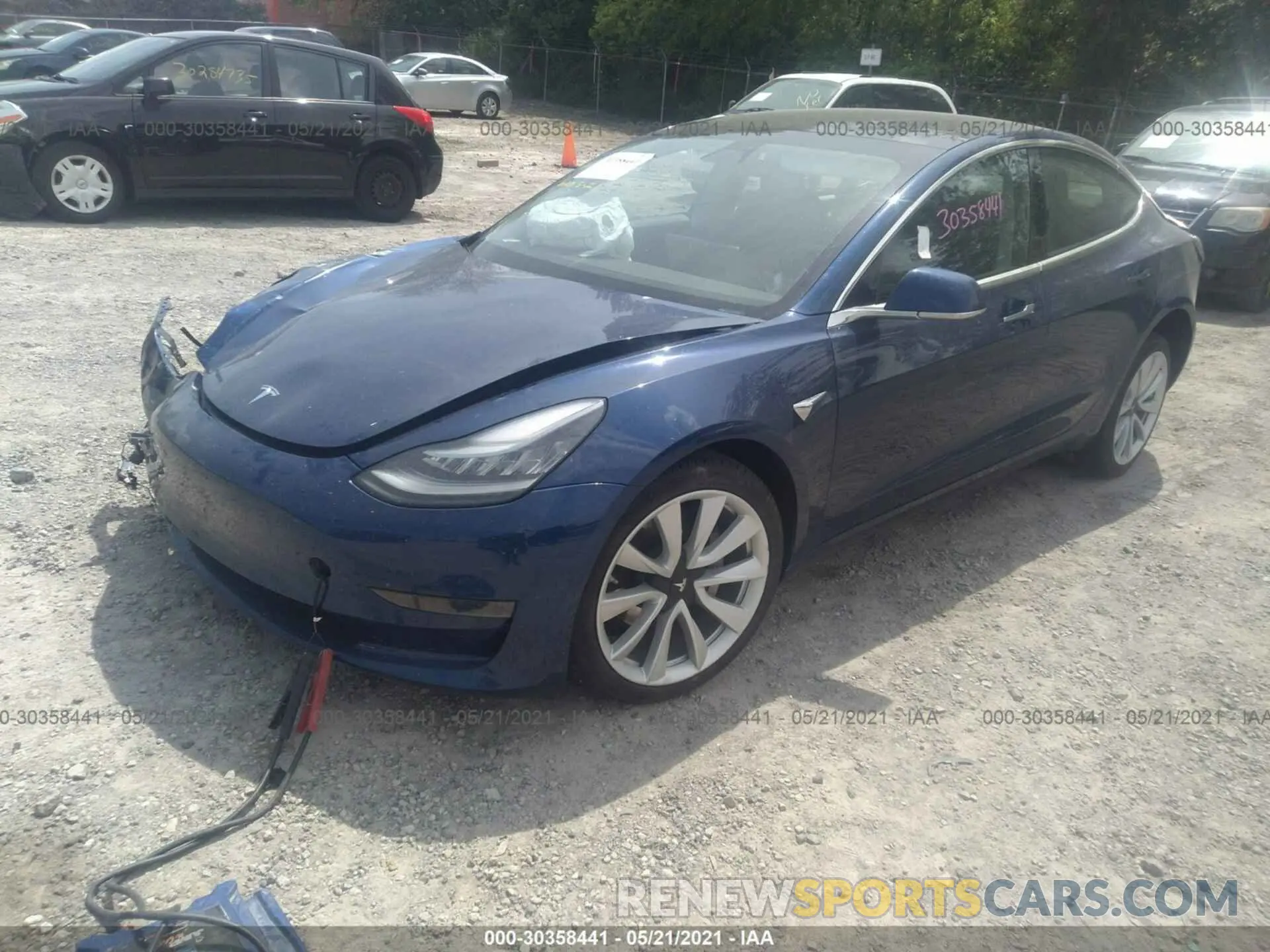 2 fotografías del automóvil dañado 5YJ3E1EA4LF708912 TESLA MODEL 3 2020