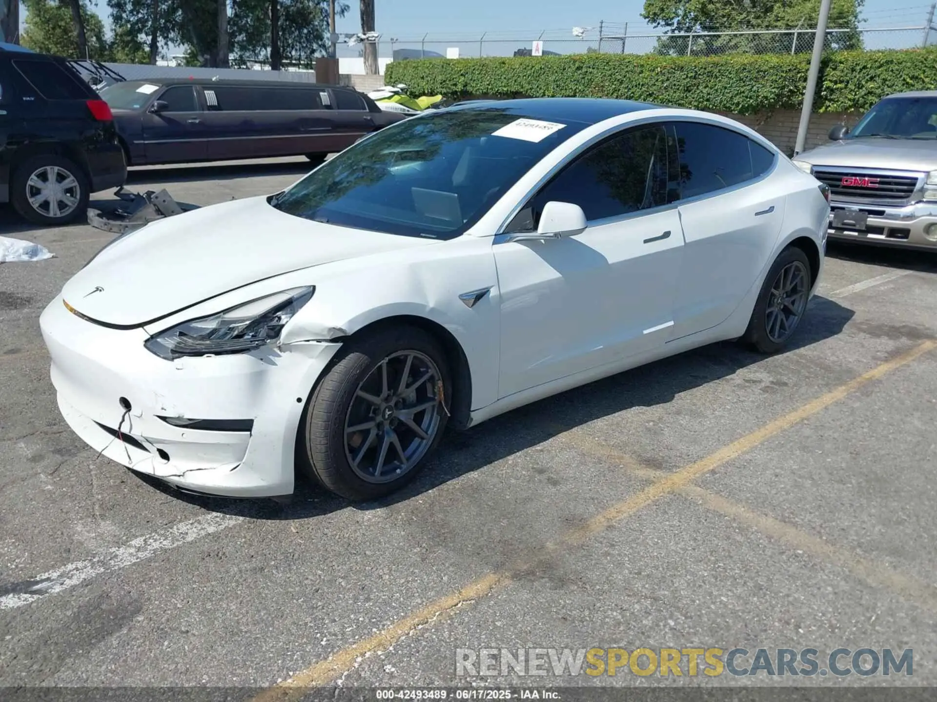 2 fotografías del automóvil dañado 5YJ3E1EA4LF740016 TESLA MODEL 3 2020