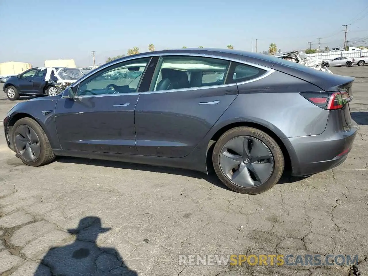 2 fotografías del automóvil dañado 5YJ3E1EA4LF743434 TESLA MODEL 3 2020