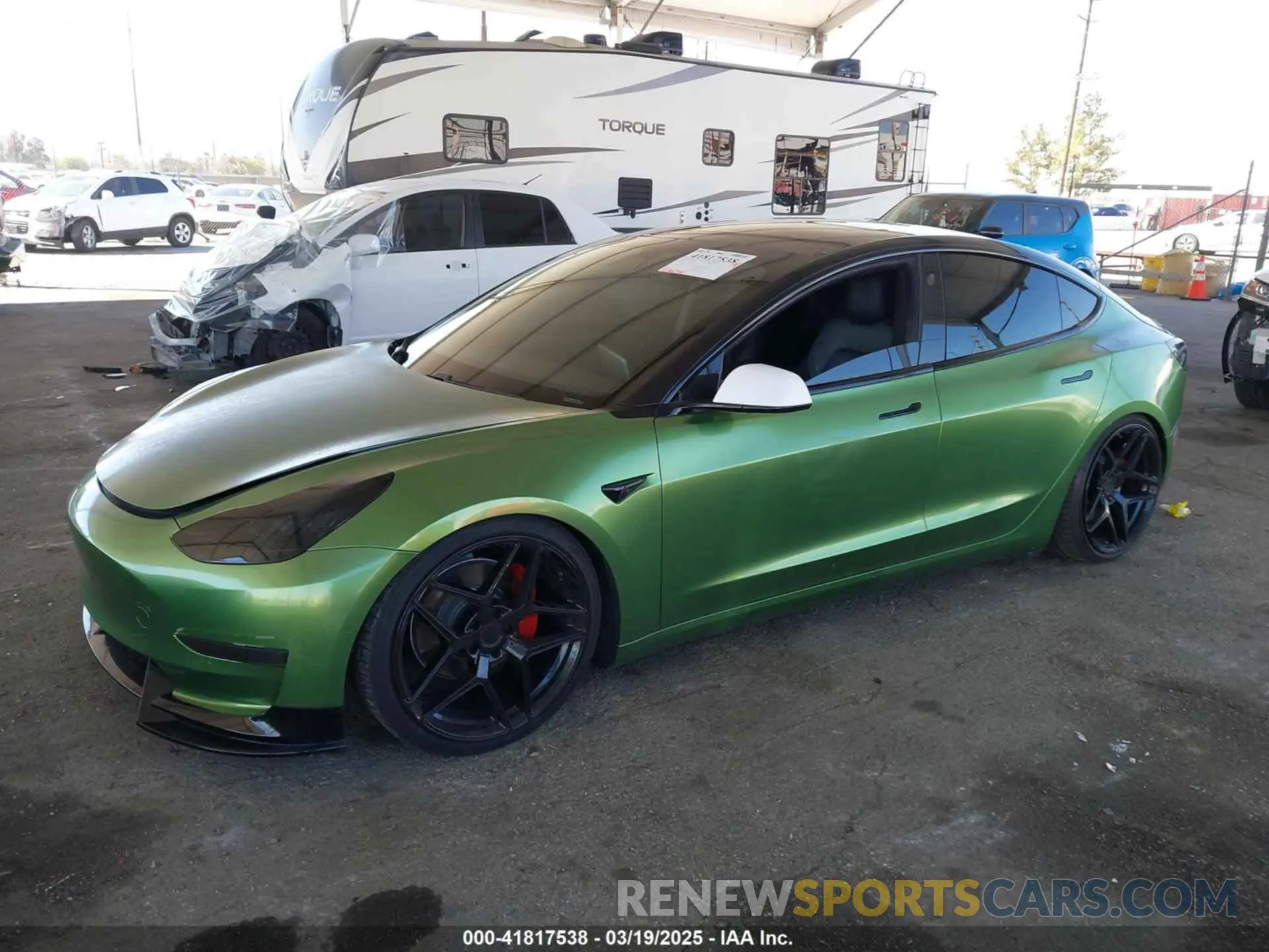 2 fotografías del automóvil dañado 5YJ3E1EA4LF799650 TESLA MODEL 3 2020