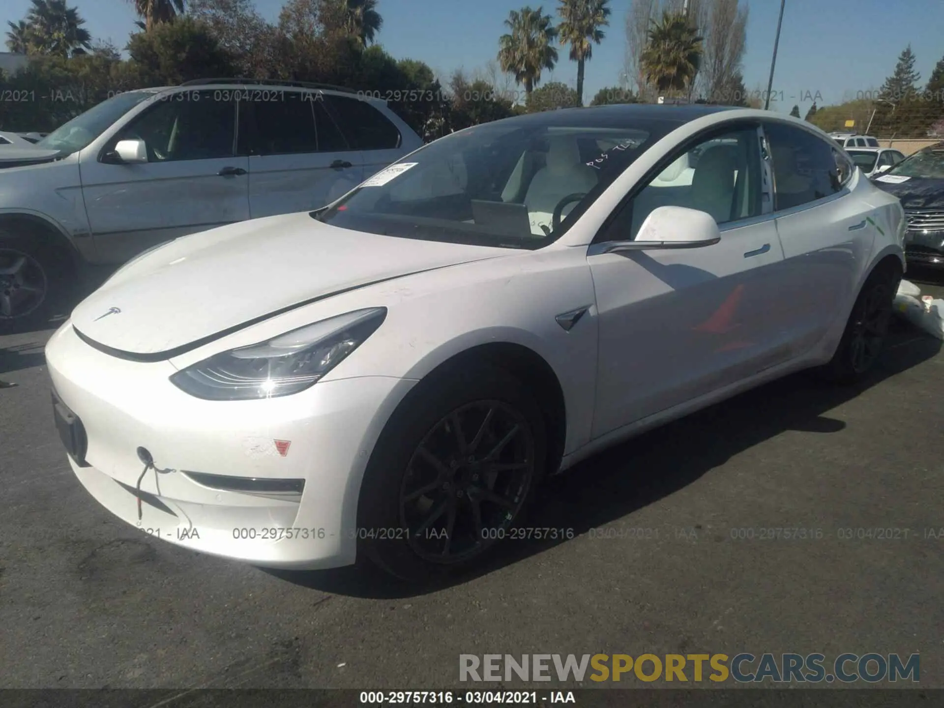 2 fotografías del automóvil dañado 5YJ3E1EA5LF615333 TESLA MODEL 3 2020