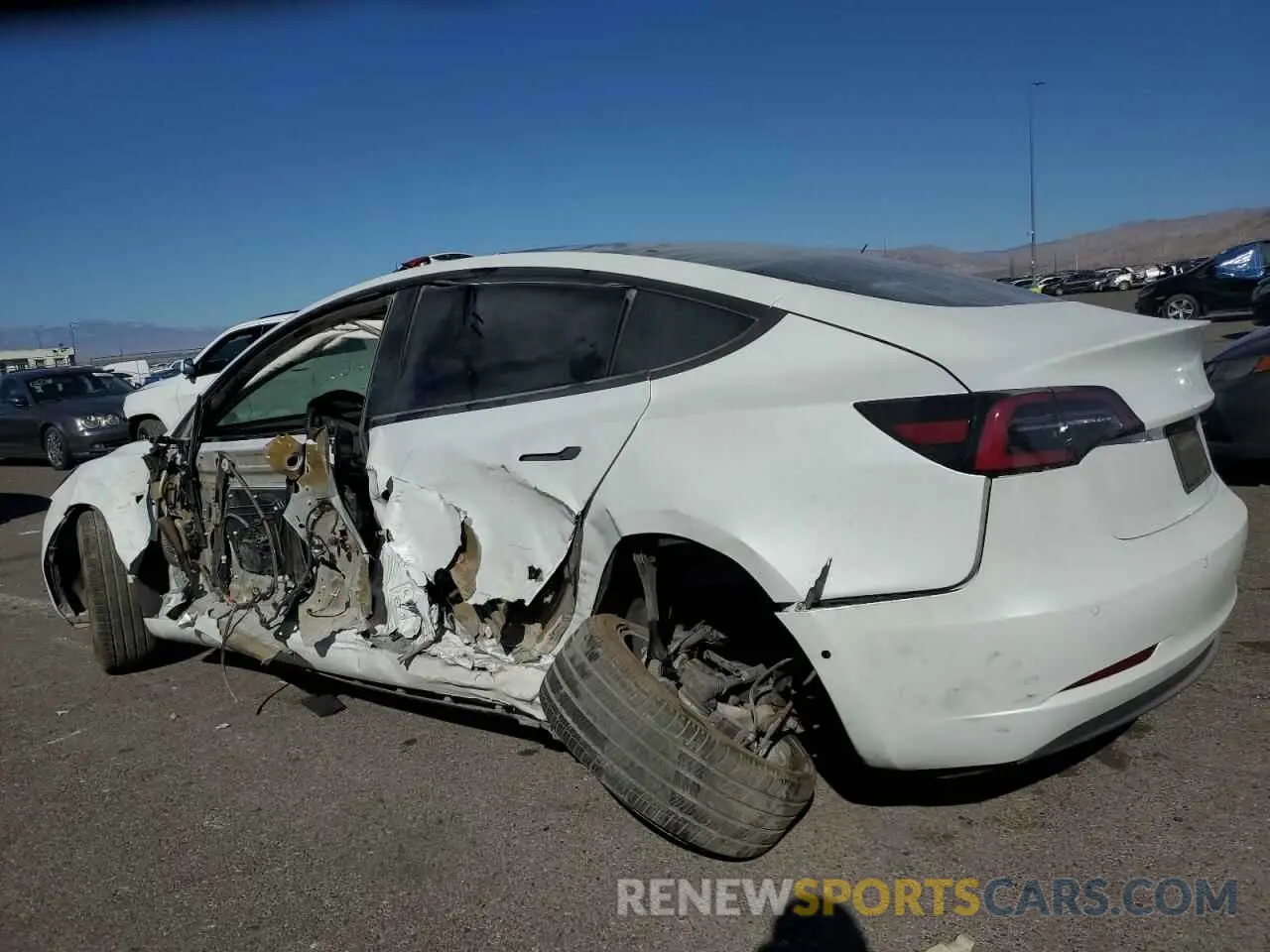 2 fotografías del automóvil dañado 5YJ3E1EA5LF745256 TESLA MODEL 3 2020