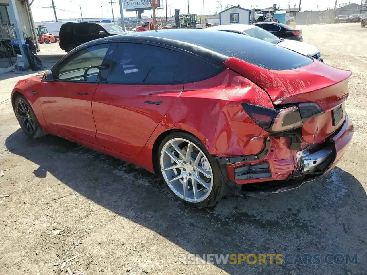 2 fotografías del automóvil dañado 5YJ3E1EA5LF802510 TESLA MODEL 3 2020