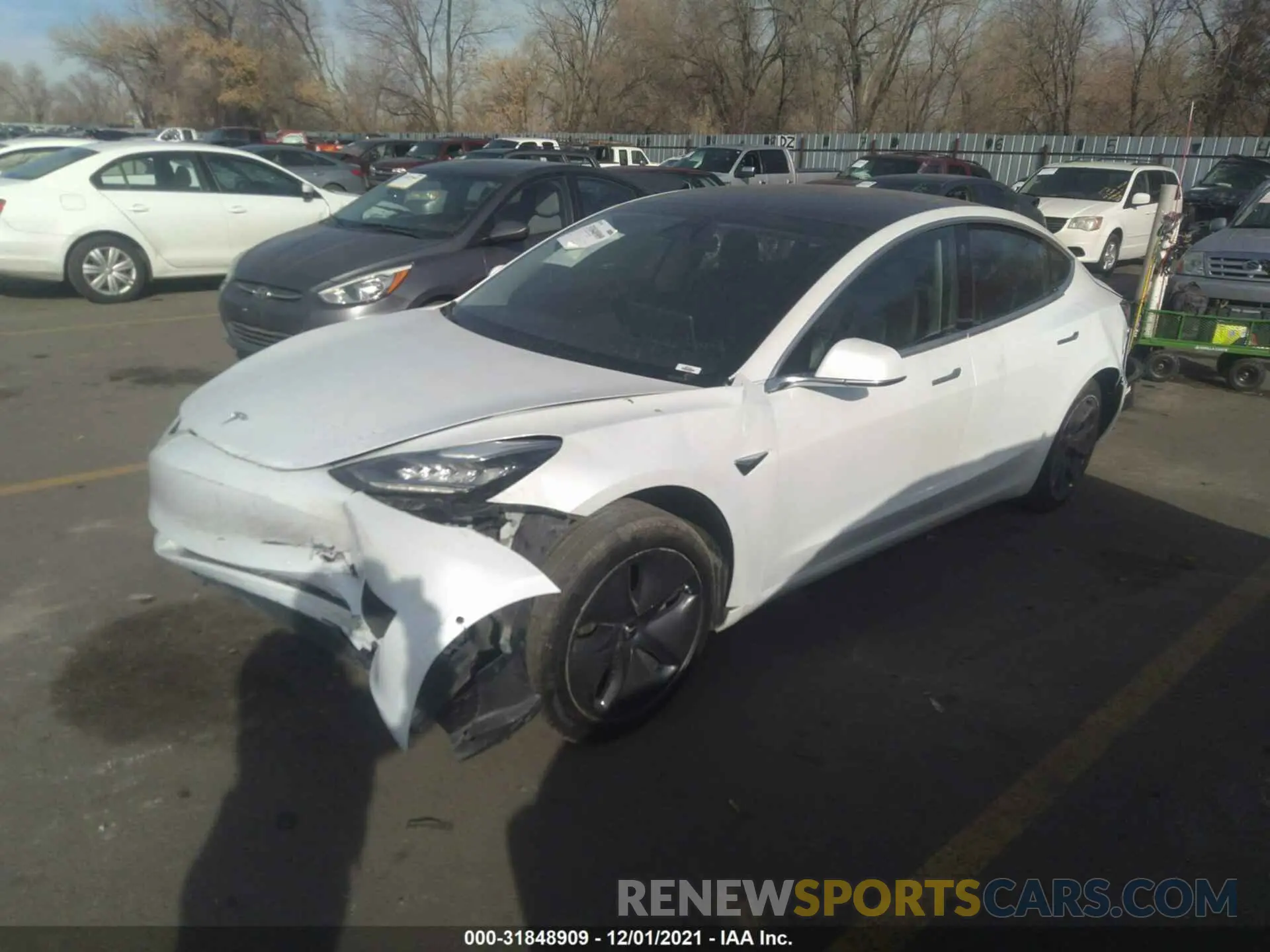2 fotografías del automóvil dañado 5YJ3E1EA6LF659910 TESLA MODEL 3 2020