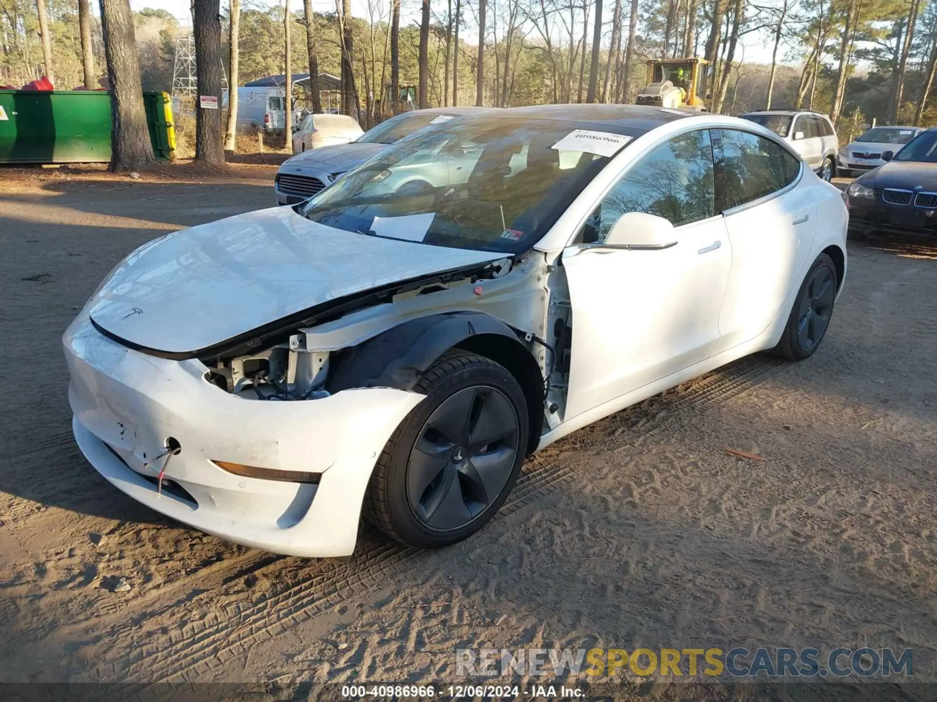 2 fotografías del automóvil dañado 5YJ3E1EA6LF709009 TESLA MODEL 3 2020