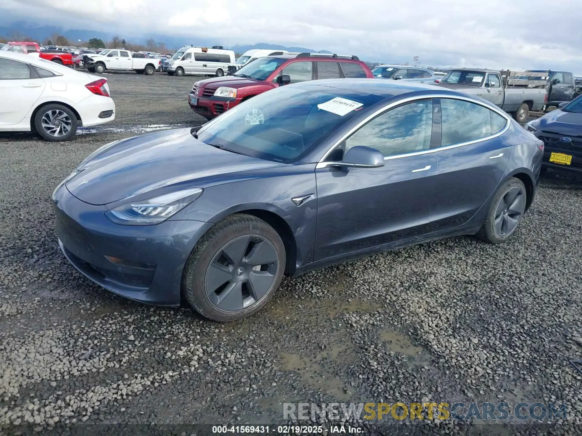 2 fotografías del automóvil dañado 5YJ3E1EA7LF611574 TESLA MODEL 3 2020