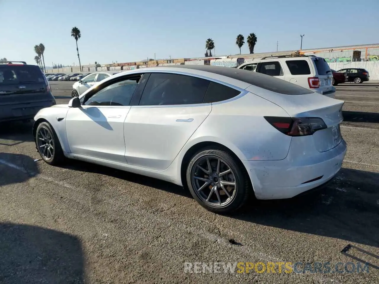 2 fotografías del automóvil dañado 5YJ3E1EA7LF803996 TESLA MODEL 3 2020