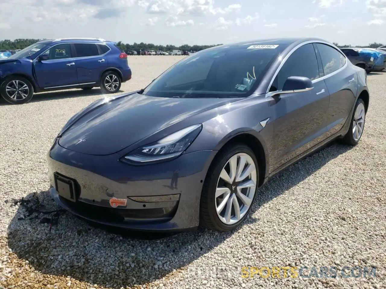 2 fotografías del automóvil dañado 5YJ3E1EA8LF616055 TESLA MODEL 3 2020