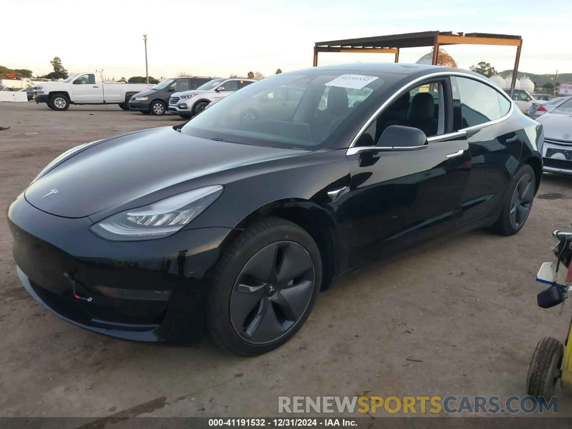 2 fotografías del automóvil dañado 5YJ3E1EA8LF630022 TESLA MODEL 3 2020
