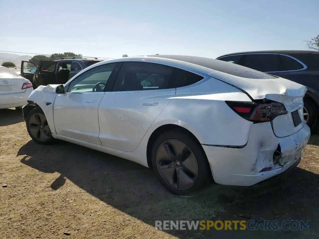 2 fotografías del automóvil dañado 5YJ3E1EA8LF633213 TESLA MODEL 3 2020