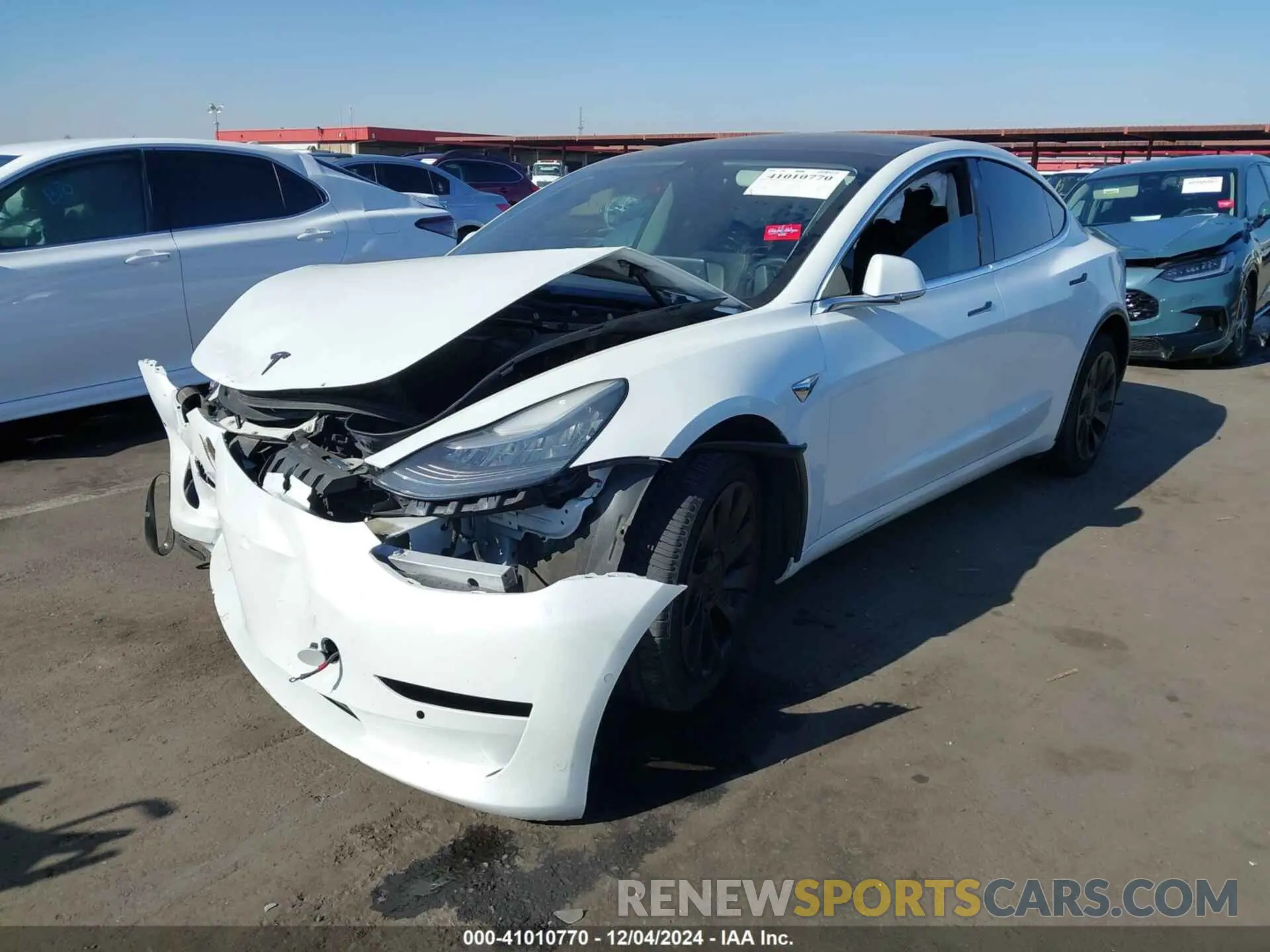 2 fotografías del automóvil dañado 5YJ3E1EA9LF612984 TESLA MODEL 3 2020