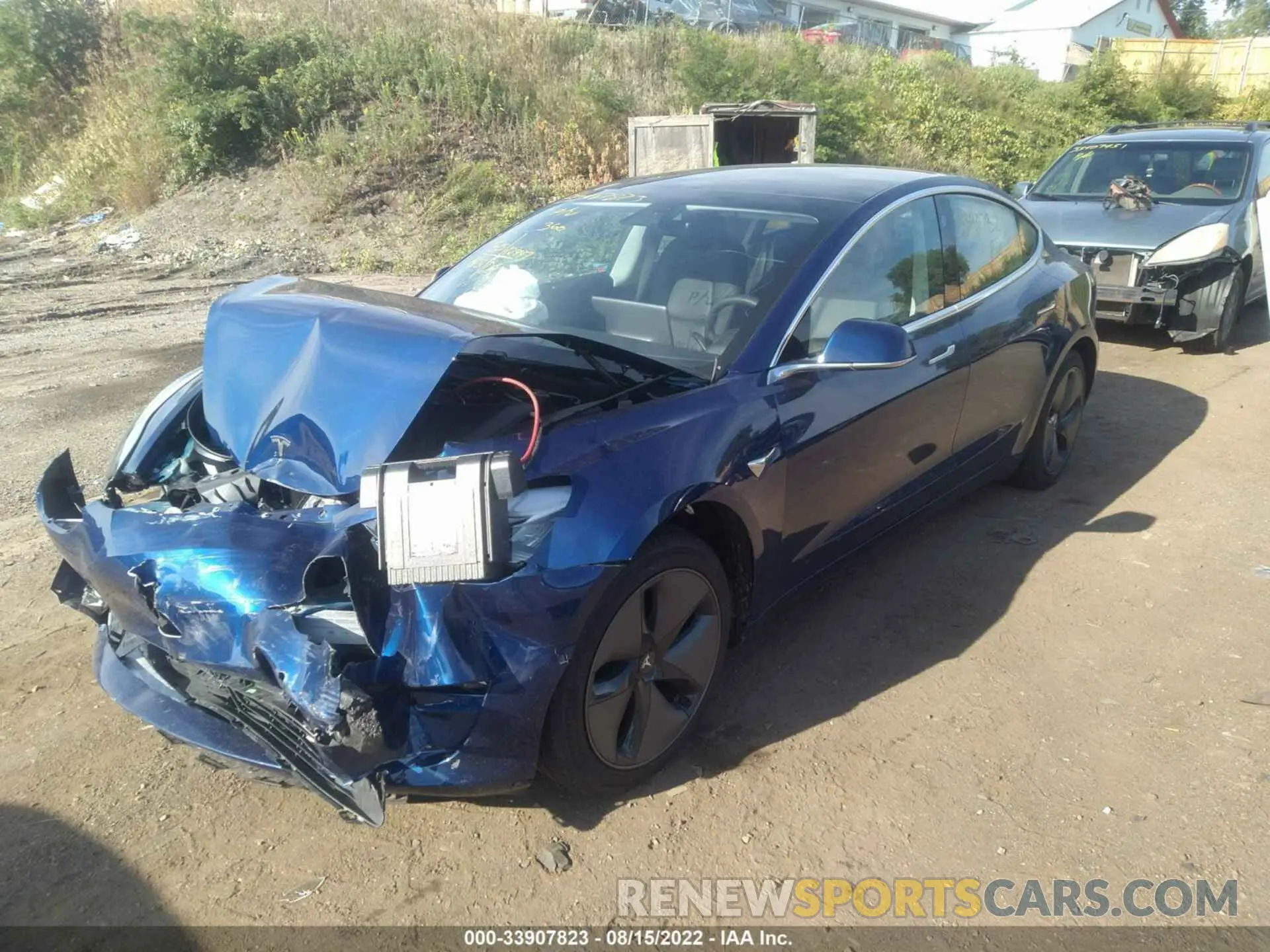 2 fotografías del automóvil dañado 5YJ3E1EA9LF658492 TESLA MODEL 3 2020