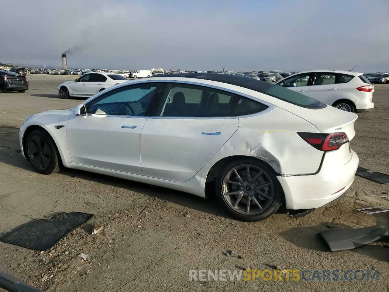 2 fotografías del automóvil dañado 5YJ3E1EA9LF706573 TESLA MODEL 3 2020