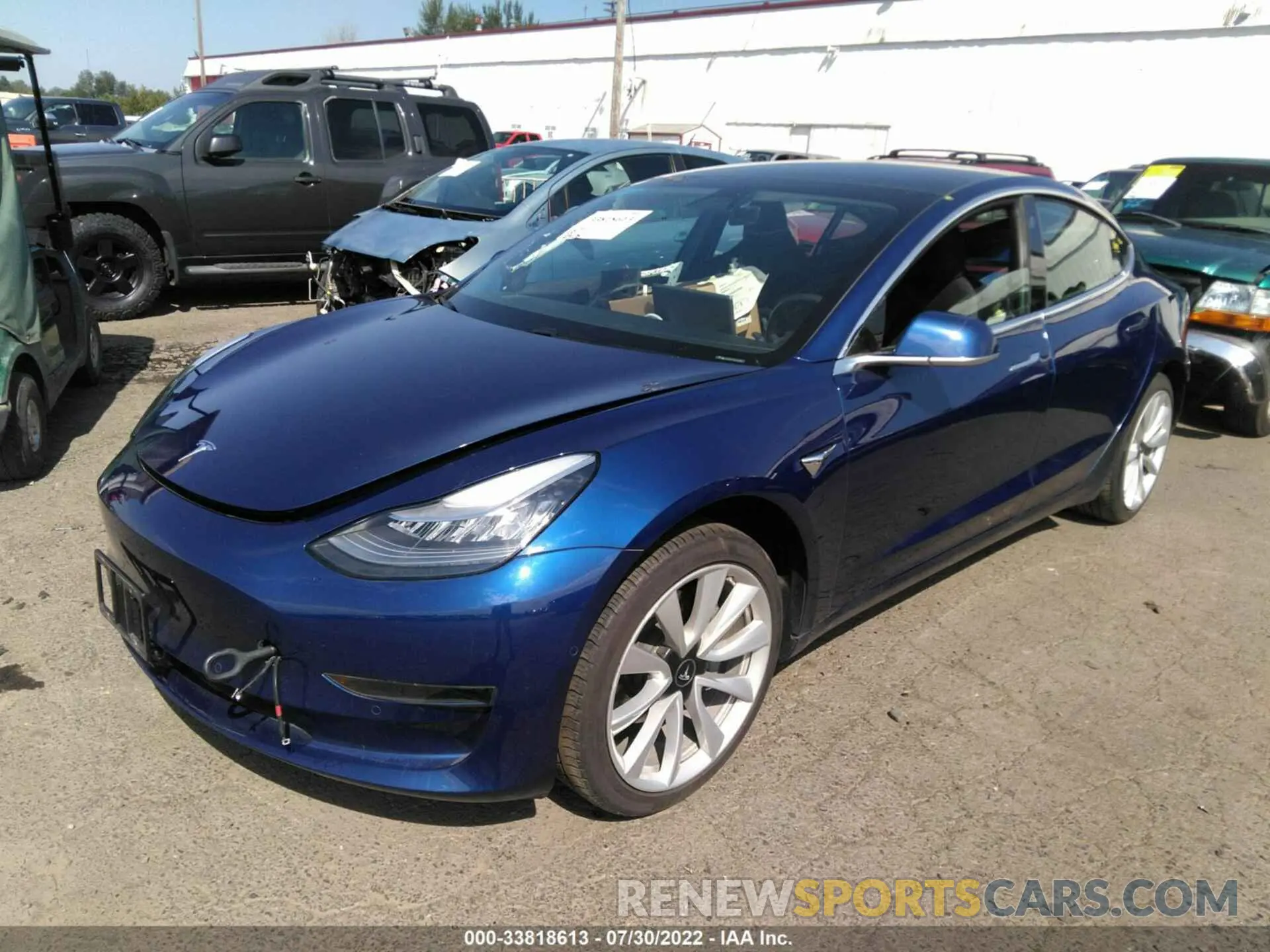 2 fotografías del automóvil dañado 5YJ3E1EAXLF614128 TESLA MODEL 3 2020
