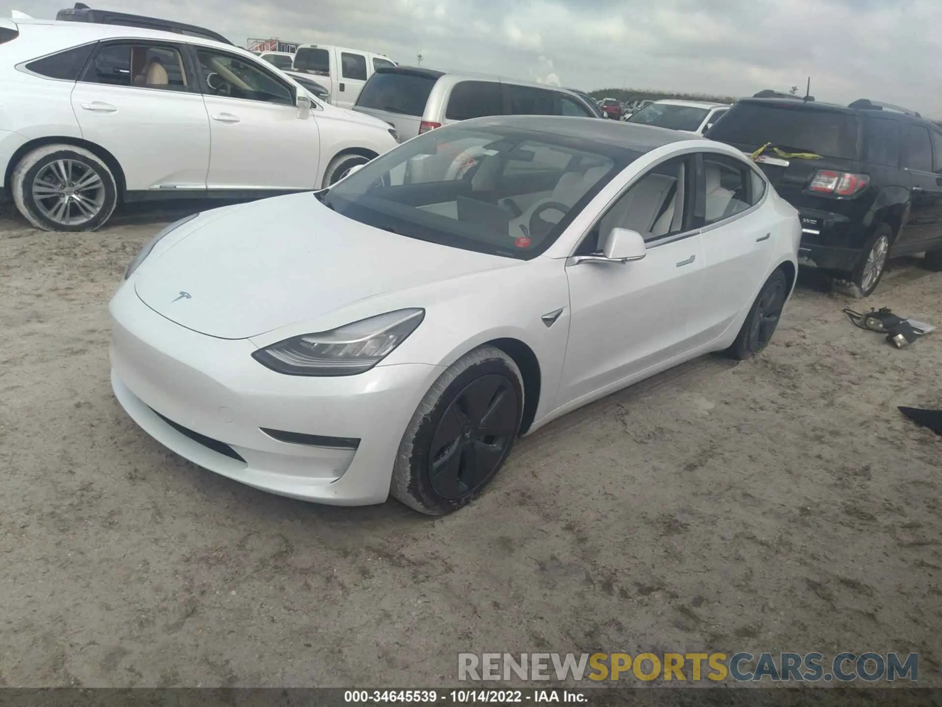 2 fotografías del automóvil dañado 5YJ3E1EB0LF787889 TESLA MODEL 3 2020