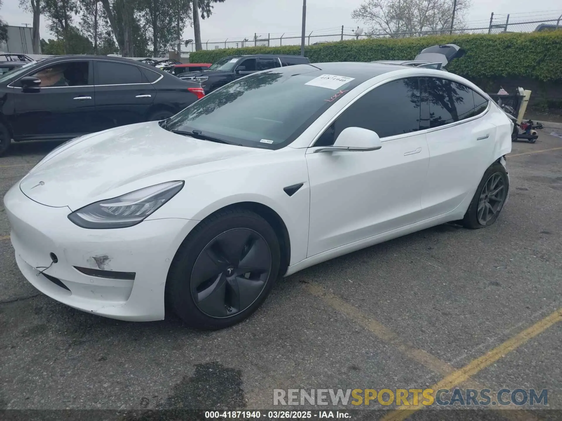 2 fotografías del automóvil dañado 5YJ3E1EB0LF803217 TESLA MODEL 3 2020