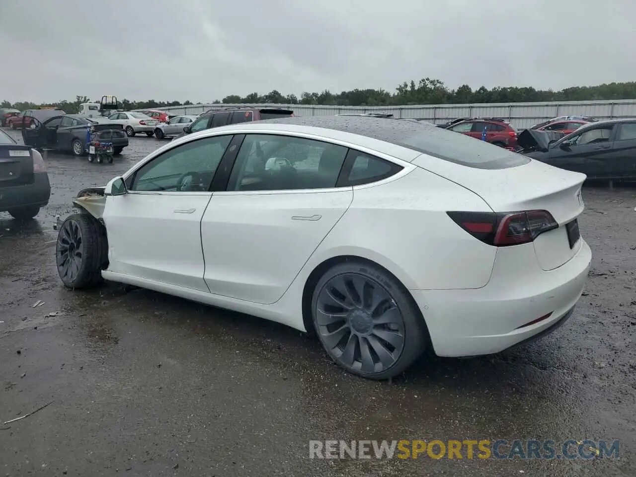 2 fotografías del automóvil dañado 5YJ3E1EB1LF617833 TESLA MODEL 3 2020
