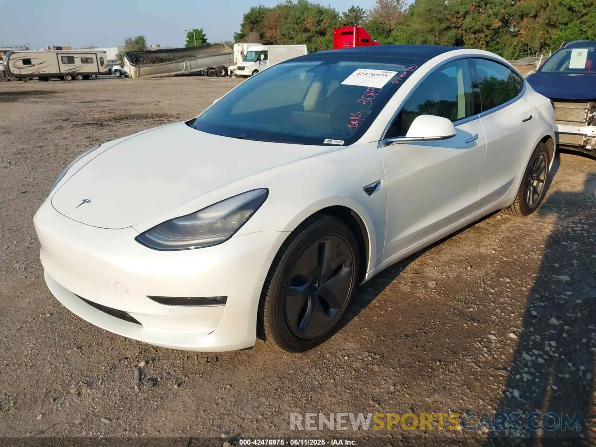 2 fotografías del automóvil dañado 5YJ3E1EB1LF665106 TESLA MODEL 3 2020