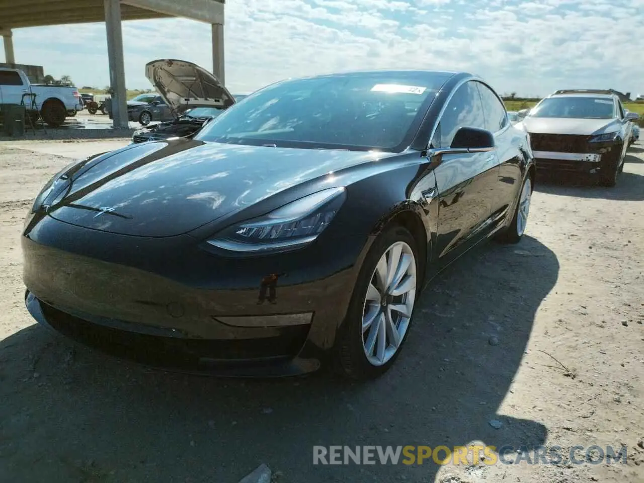 2 fotografías del automóvil dañado 5YJ3E1EB1LF721450 TESLA MODEL 3 2020
