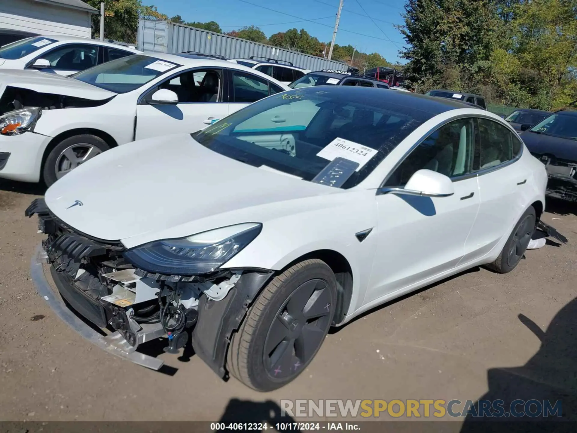 2 fotografías del automóvil dañado 5YJ3E1EB2LF618201 TESLA MODEL 3 2020