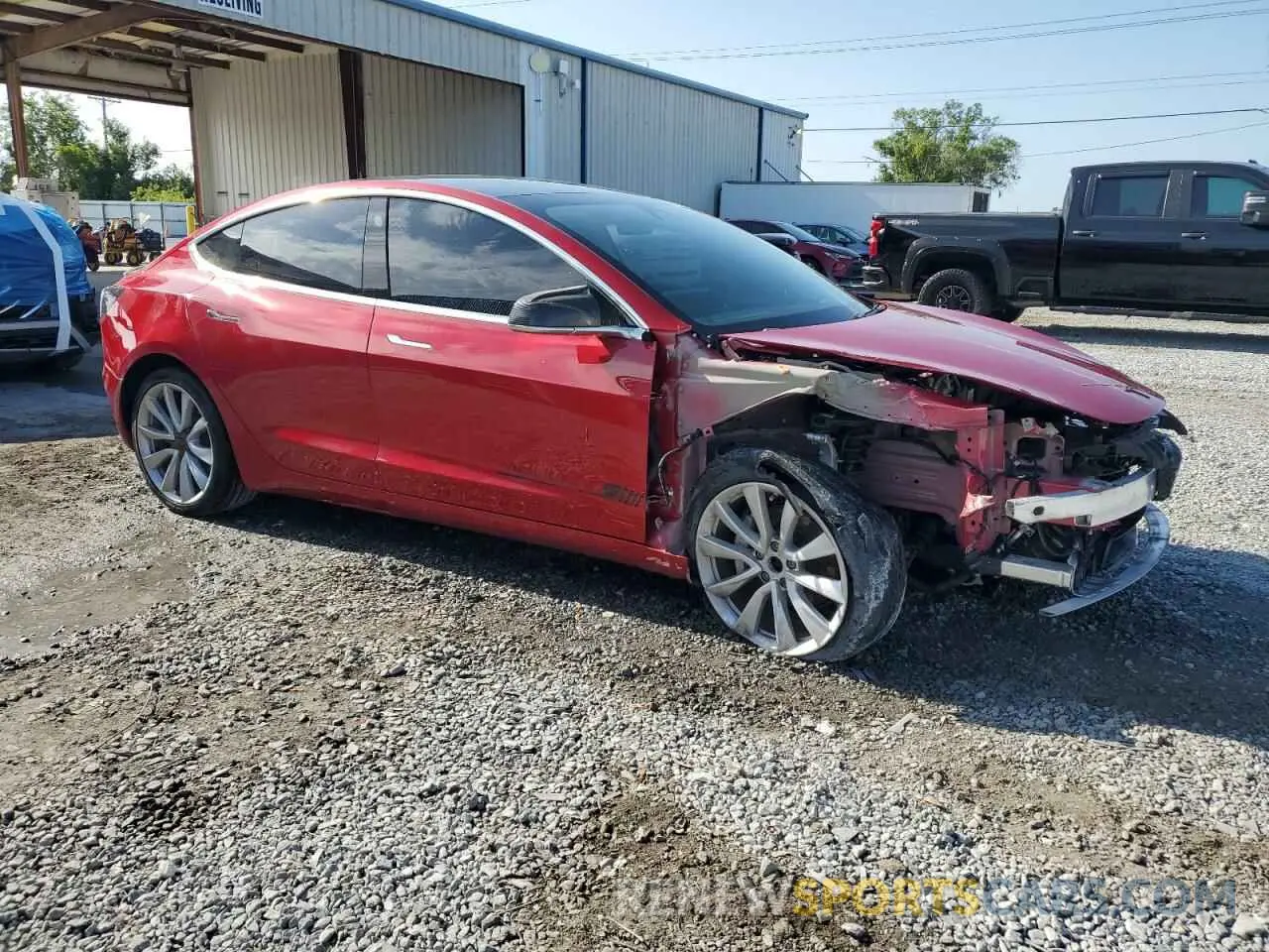 4 fotografías del automóvil dañado 5YJ3E1EB2LF735969 TESLA MODEL 3 2020
