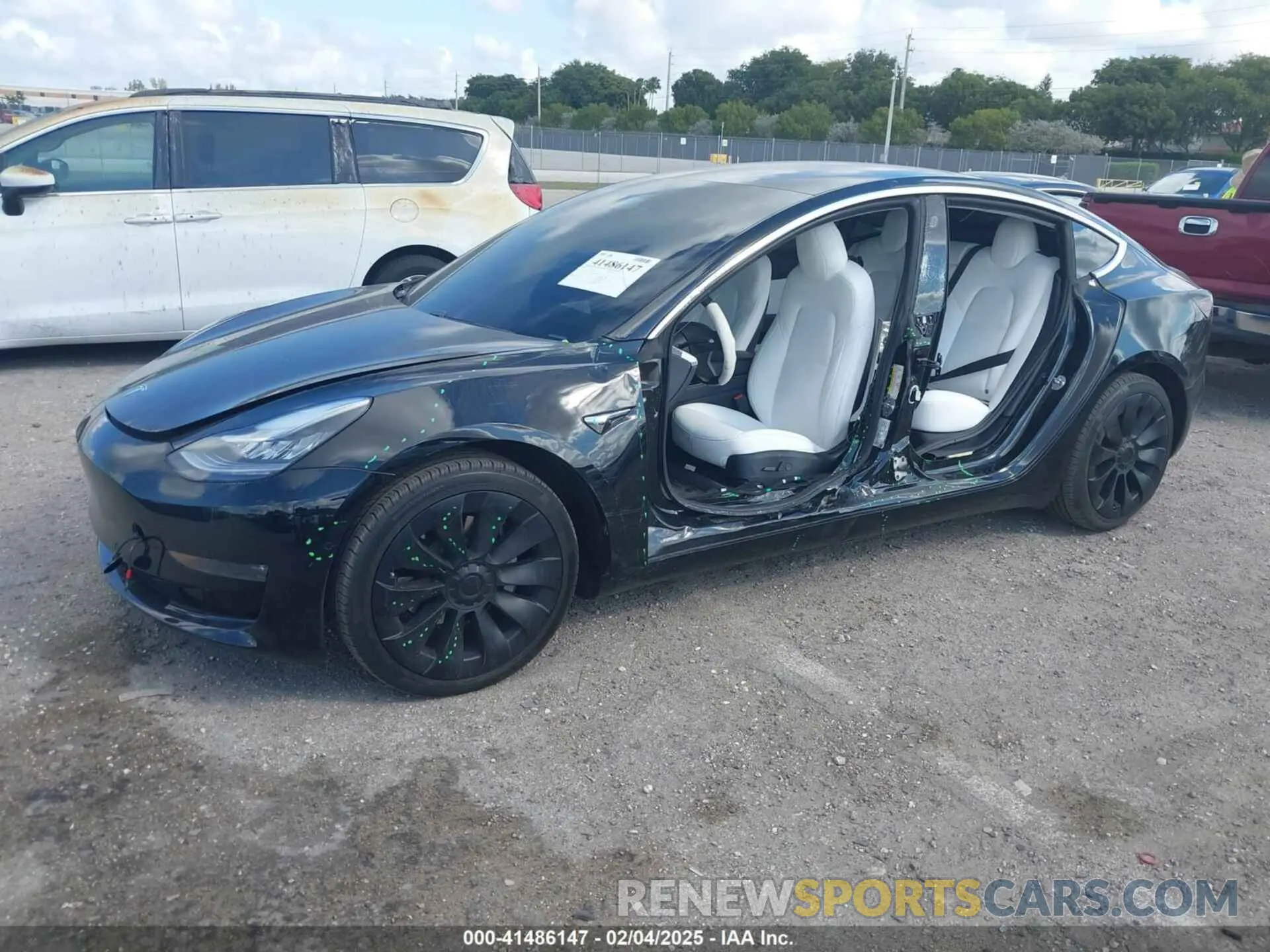 2 fotografías del automóvil dañado 5YJ3E1EB3LF622323 TESLA MODEL 3 2020