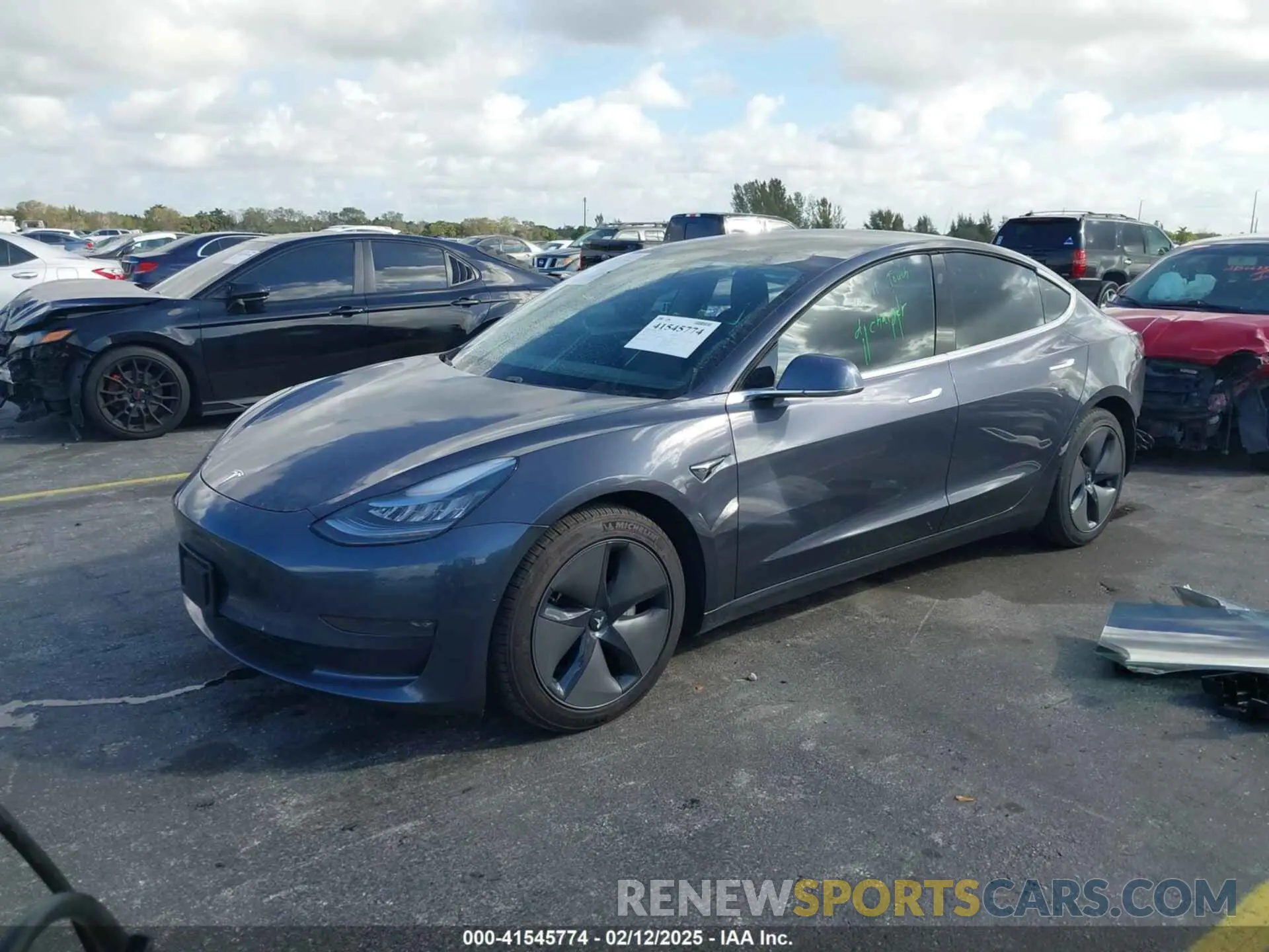 2 fotografías del automóvil dañado 5YJ3E1EB3LF663437 TESLA MODEL 3 2020