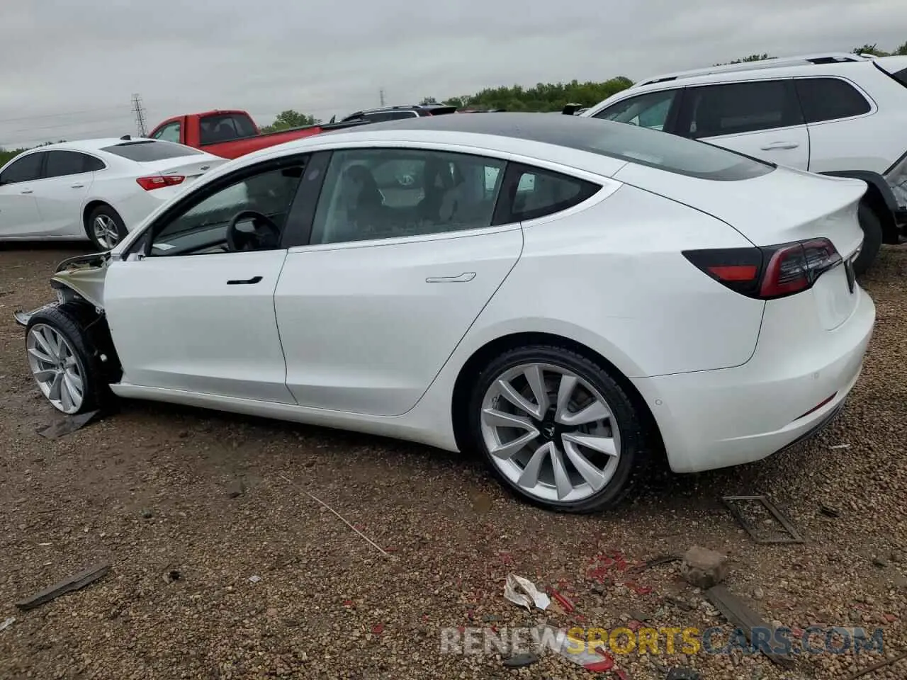 2 fotografías del automóvil dañado 5YJ3E1EB3LF667522 TESLA MODEL 3 2020