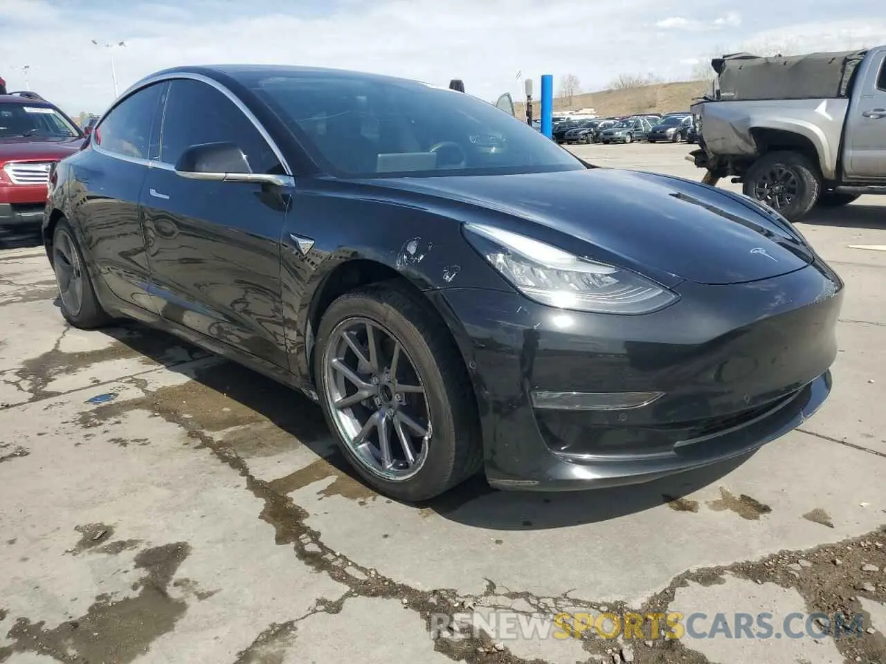 4 fotografías del automóvil dañado 5YJ3E1EB4LF599909 TESLA MODEL 3 2020
