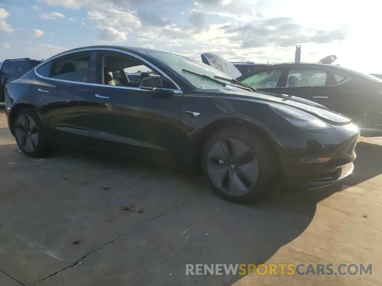 4 fotografías del automóvil dañado 5YJ3E1EB4LF600203 TESLA MODEL 3 2020