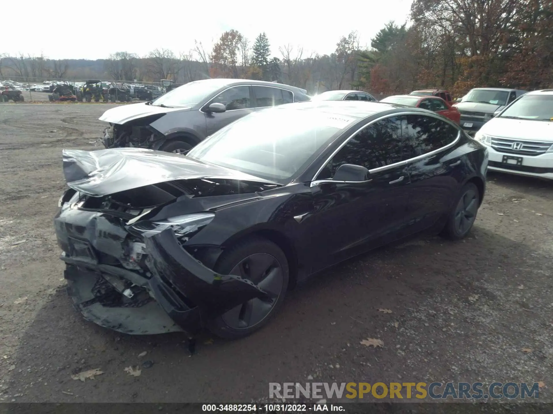 2 fotografías del automóvil dañado 5YJ3E1EB4LF662782 TESLA MODEL 3 2020