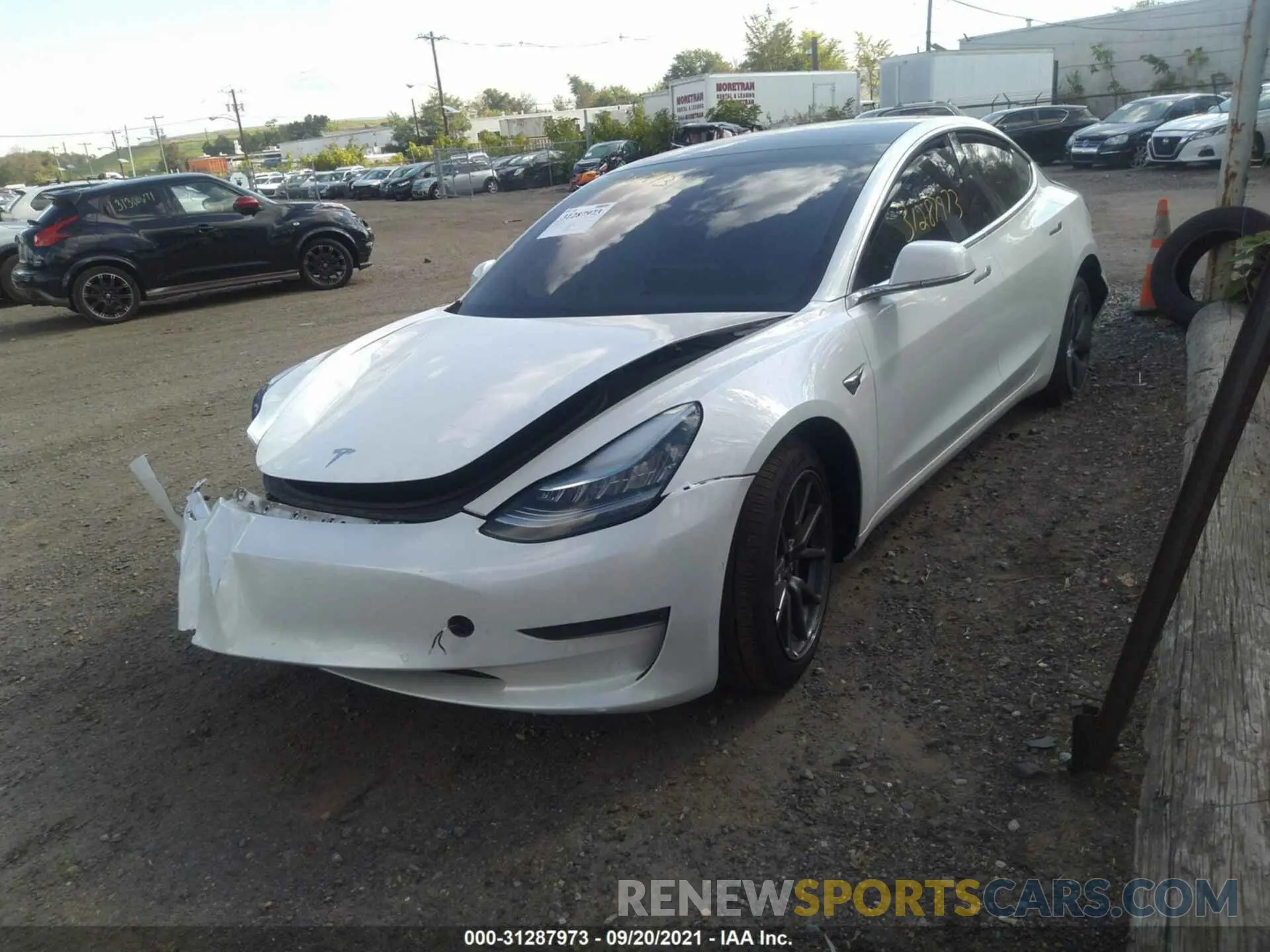 2 fotografías del automóvil dañado 5YJ3E1EB4LF735228 TESLA MODEL 3 2020