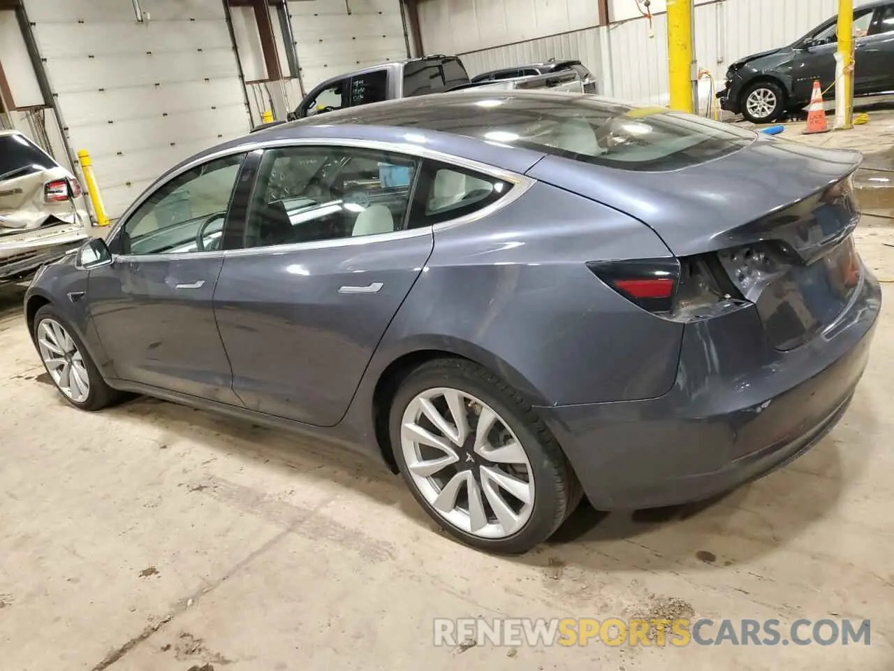 2 fotografías del automóvil dañado 5YJ3E1EB4LF795980 TESLA MODEL 3 2020