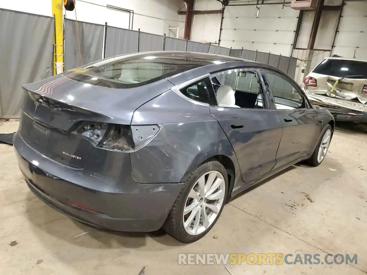 3 fotografías del automóvil dañado 5YJ3E1EB4LF795980 TESLA MODEL 3 2020