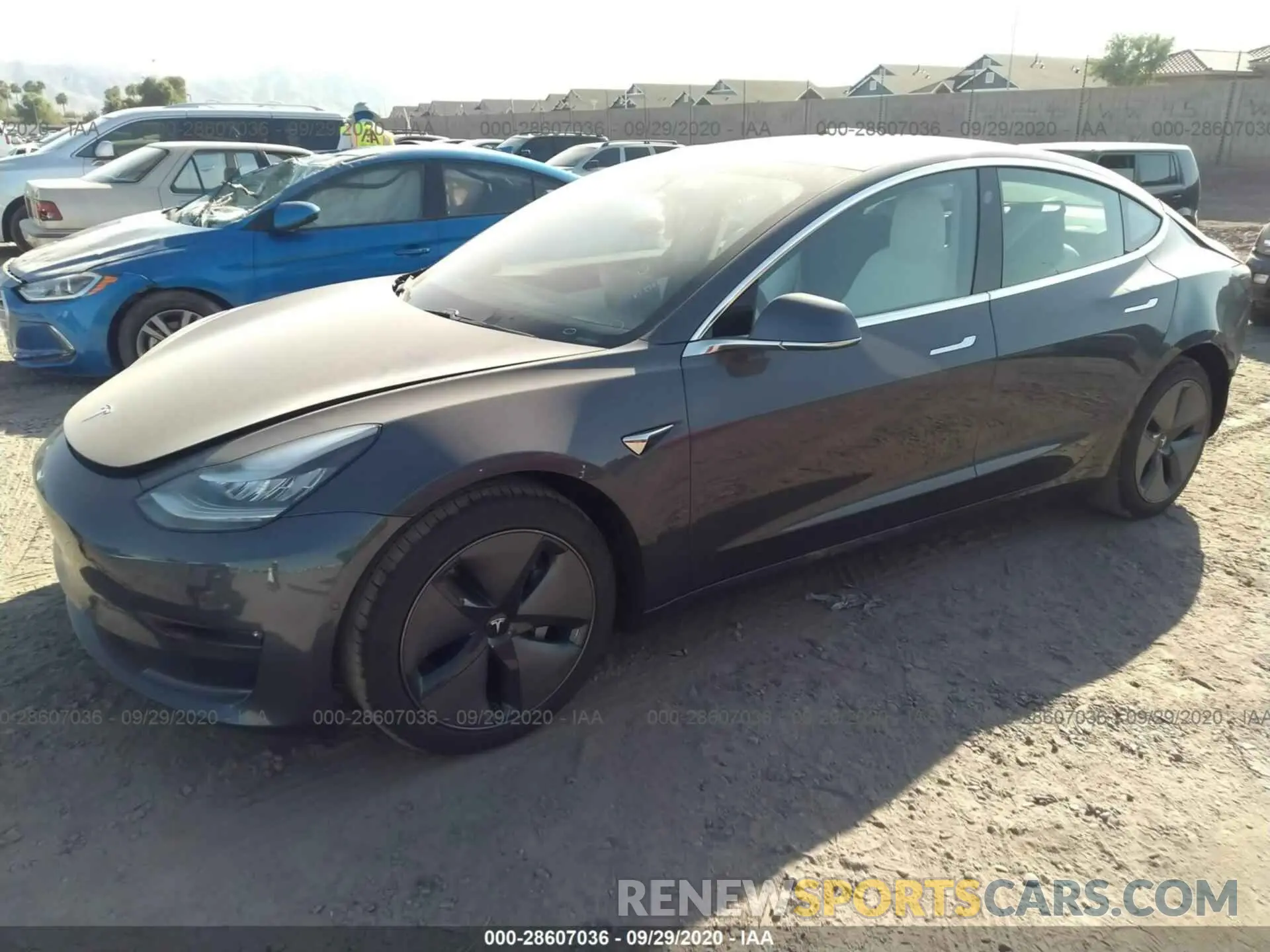 2 fotografías del automóvil dañado 5YJ3E1EB5LF651385 TESLA MODEL 3 2020