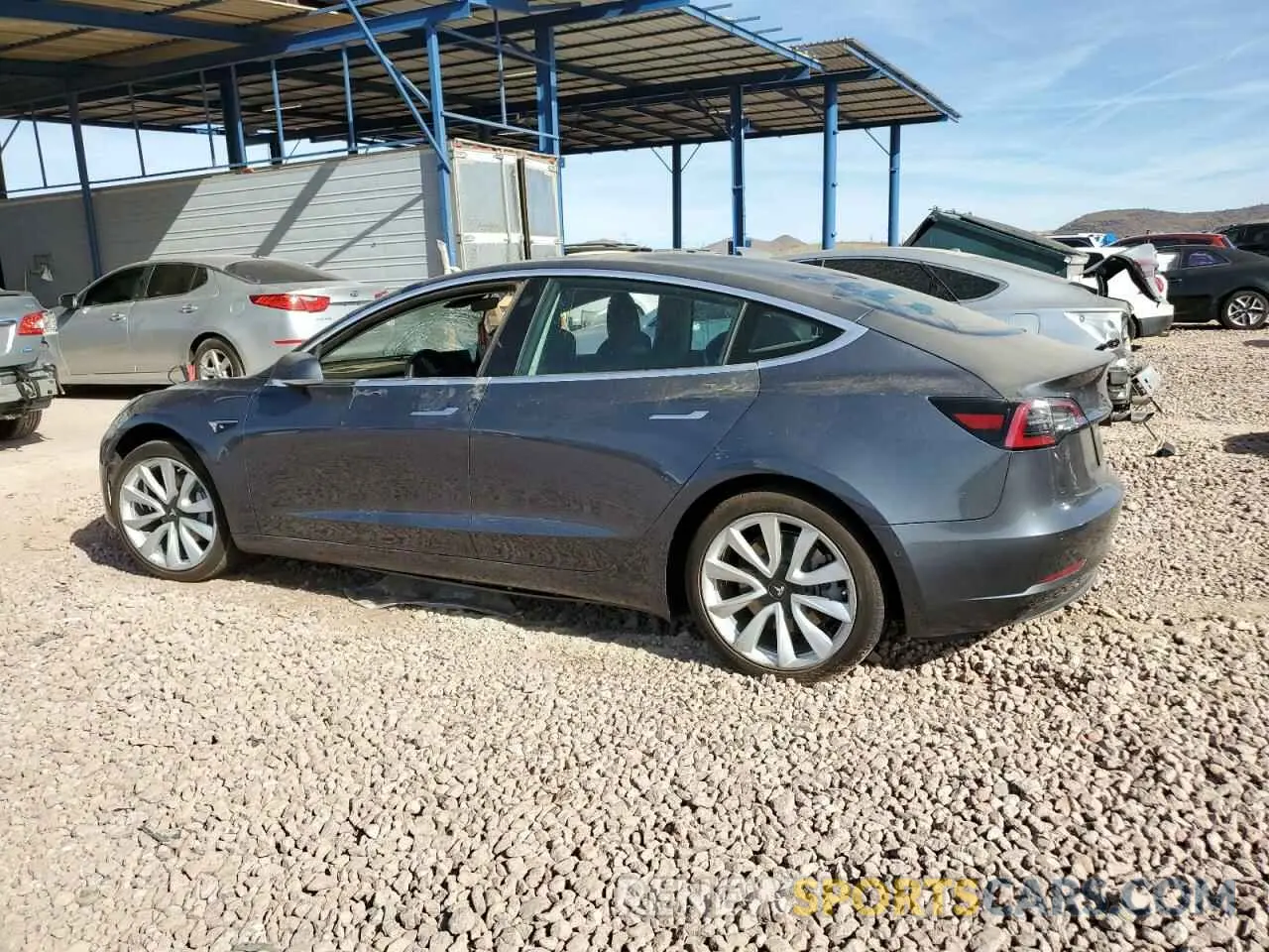 2 fotografías del automóvil dañado 5YJ3E1EB6LF638063 TESLA MODEL 3 2020