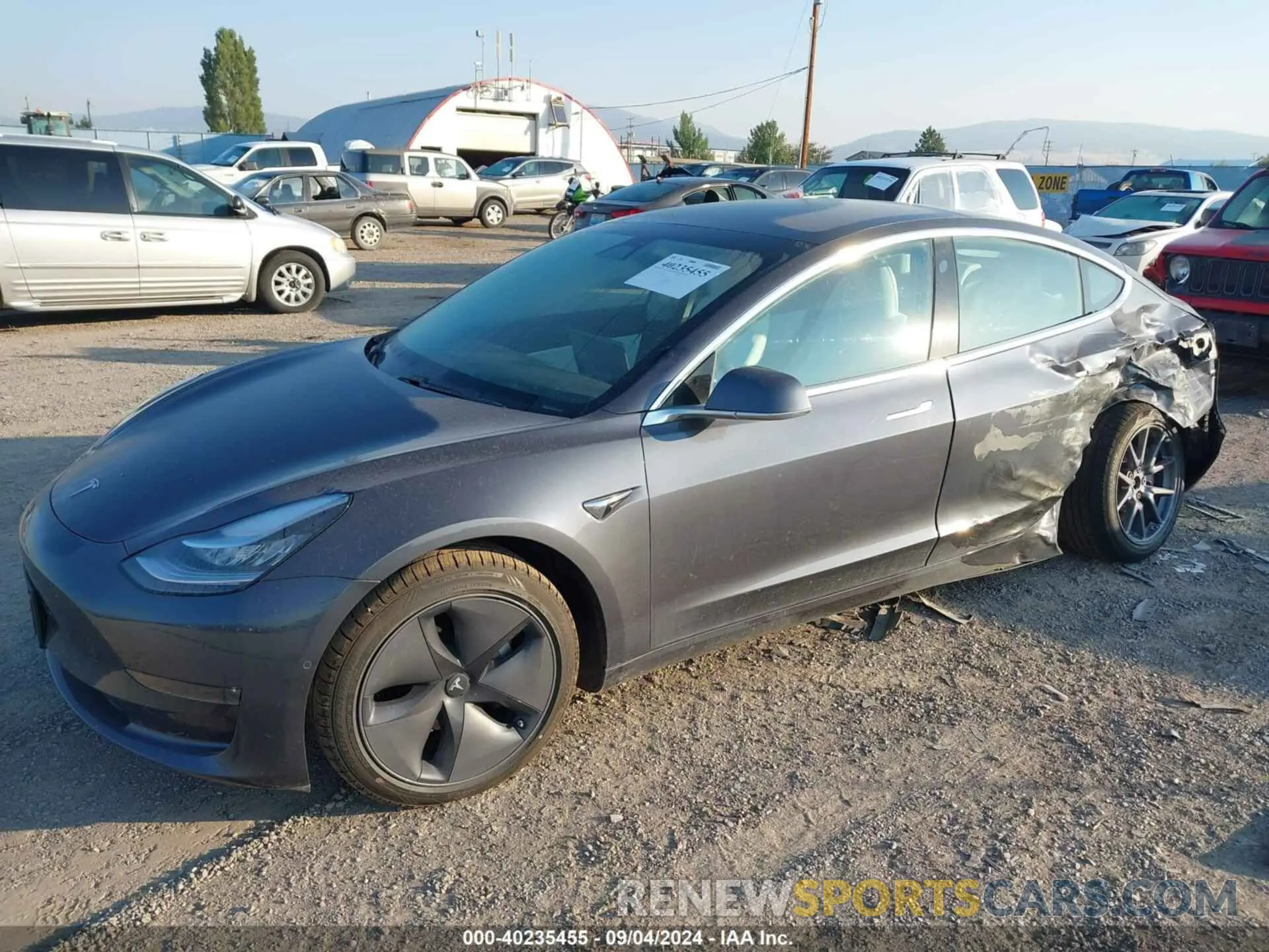 2 fotografías del automóvil dañado 5YJ3E1EB6LF651332 TESLA MODEL 3 2020