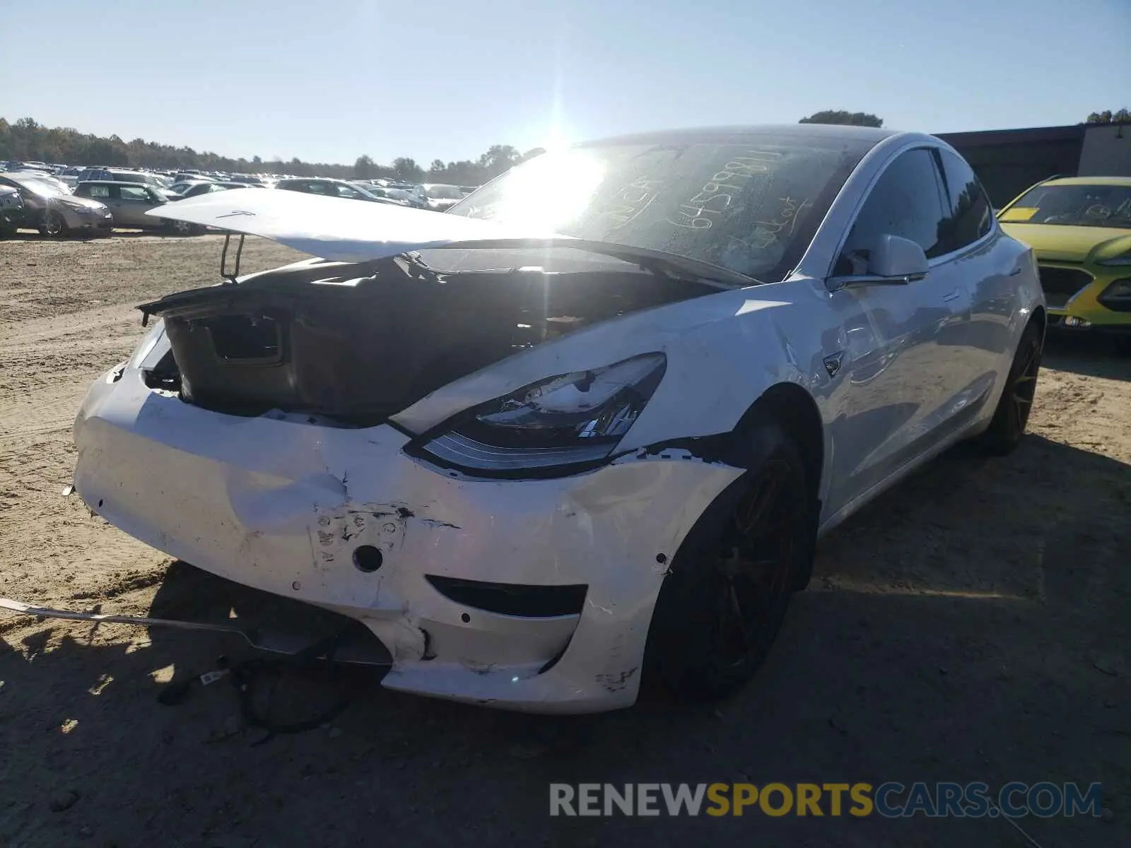 2 fotografías del automóvil dañado 5YJ3E1EB7LF665062 TESLA MODEL 3 2020
