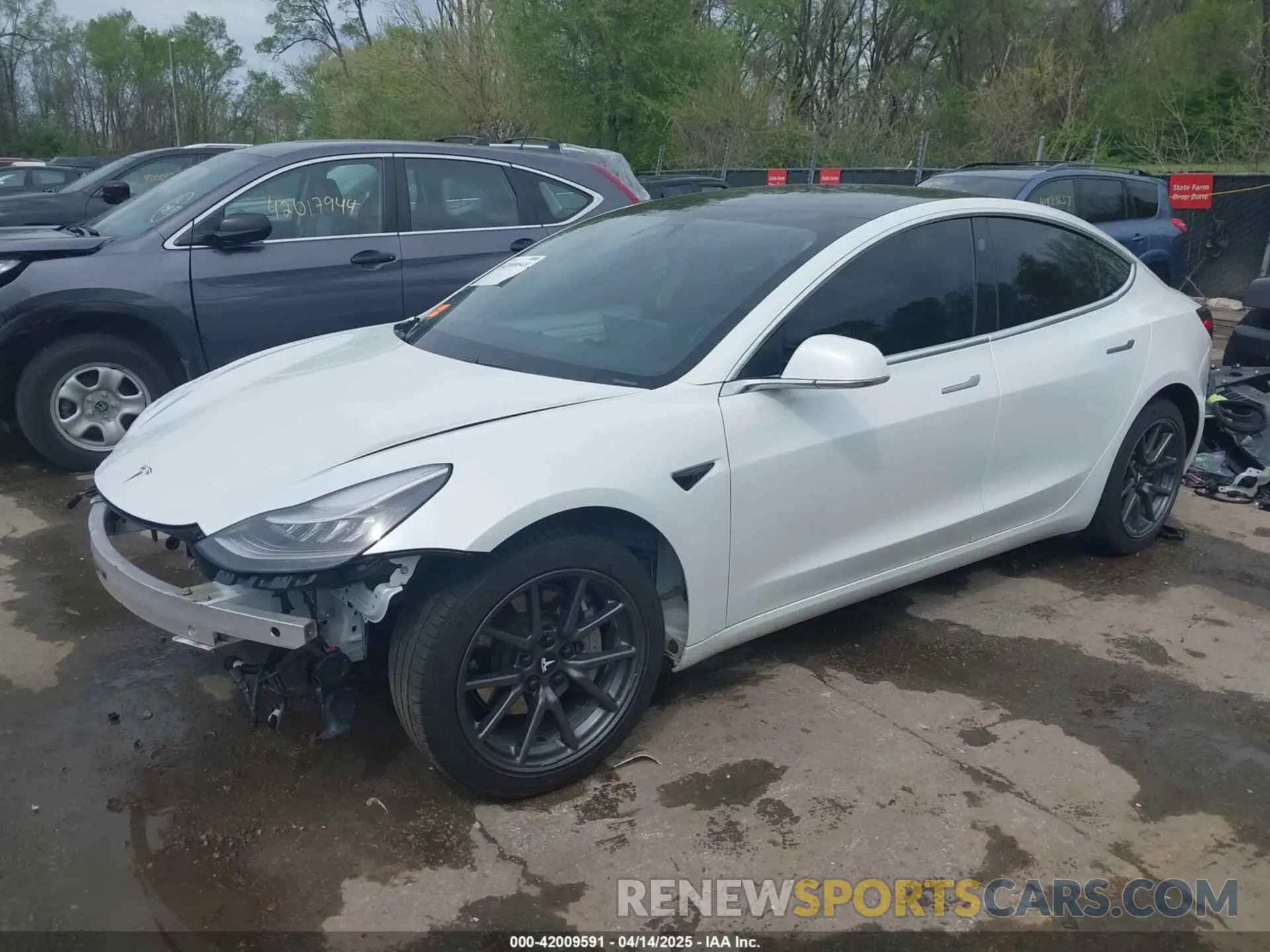2 fotografías del automóvil dañado 5YJ3E1EB7LF786903 TESLA MODEL 3 2020