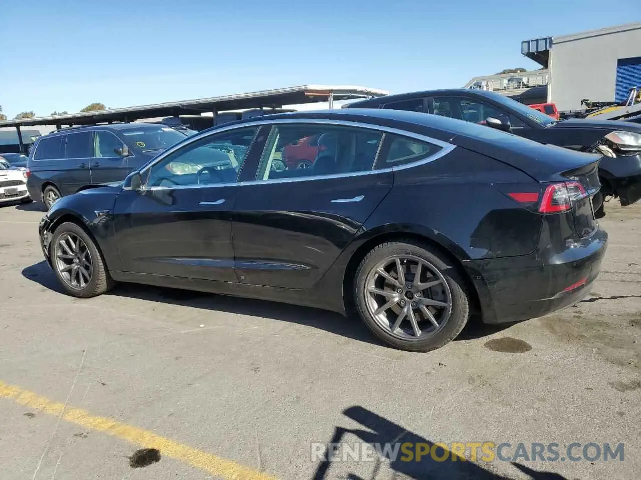 2 fotografías del automóvil dañado 5YJ3E1EB8LF599945 TESLA MODEL 3 2020