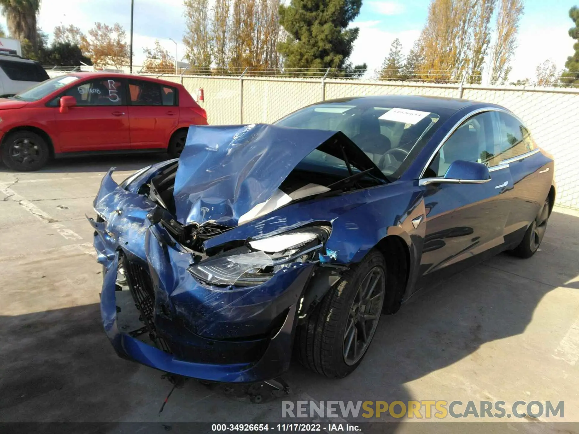 2 fotografías del automóvil dañado 5YJ3E1EB8LF636072 TESLA MODEL 3 2020