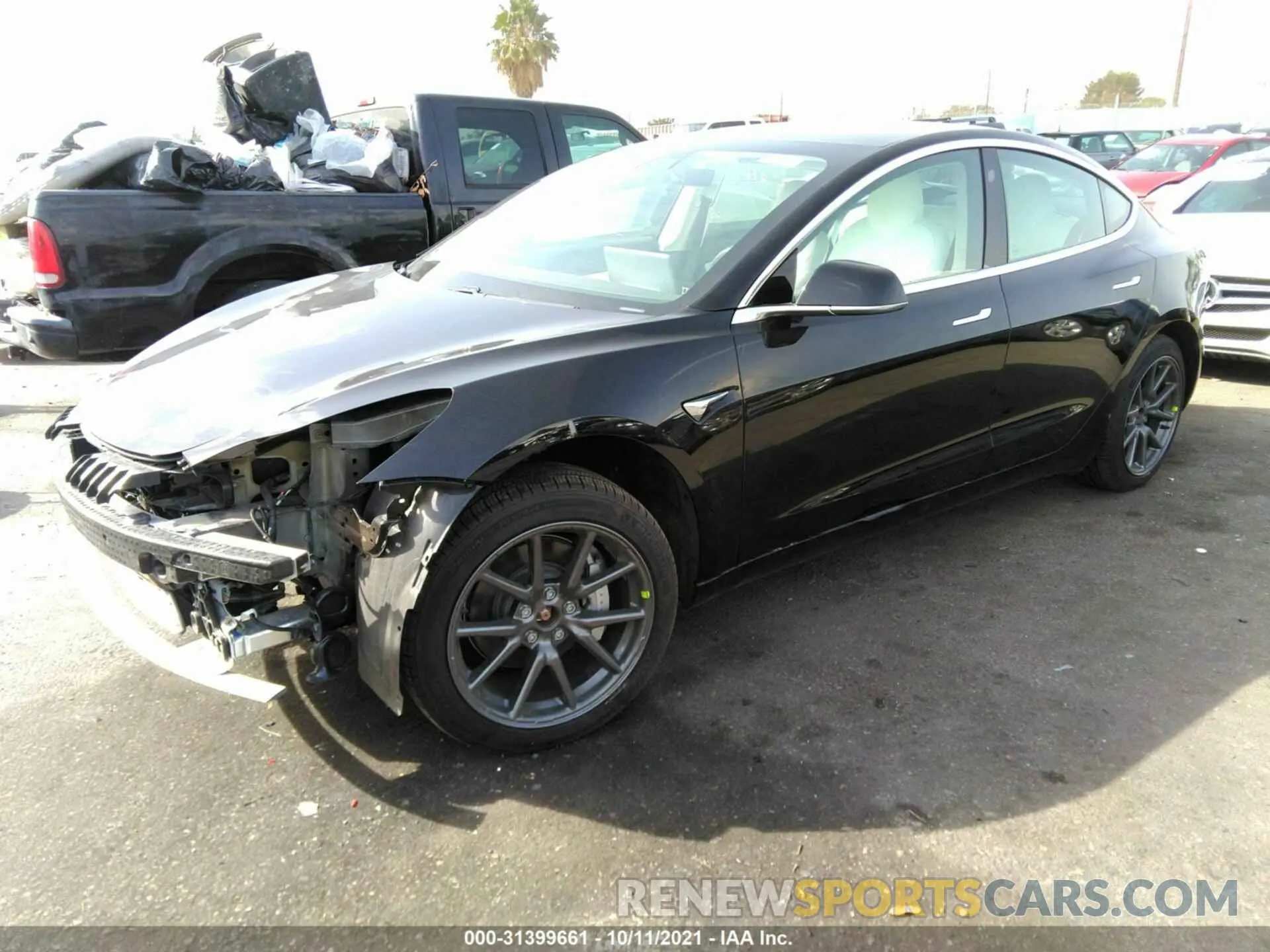 2 fotografías del automóvil dañado 5YJ3E1EB8LF638971 TESLA MODEL 3 2020