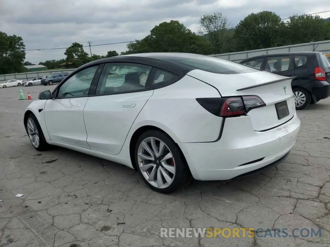 2 fotografías del automóvil dañado 5YJ3E1EB9LF667394 TESLA MODEL 3 2020