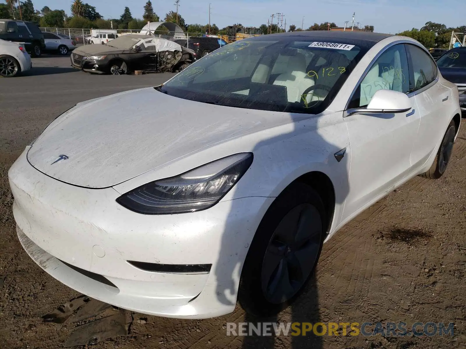 2 fotografías del automóvil dañado 5YJ3E1EB9LF720076 TESLA MODEL 3 2020