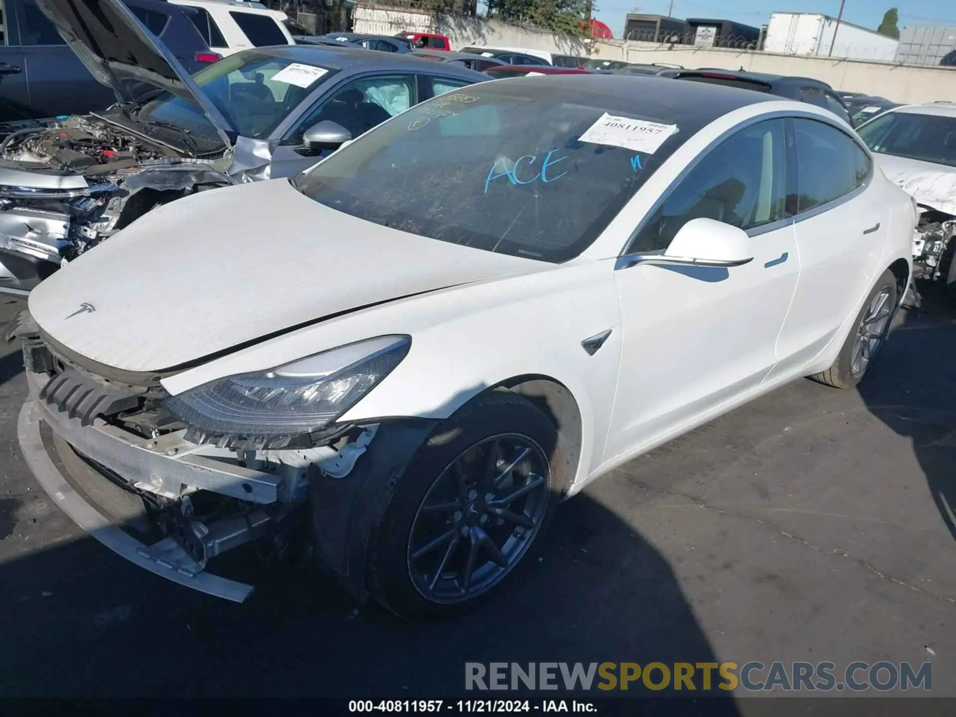 2 fotografías del automóvil dañado 5YJ3E1EBXLF665959 TESLA MODEL 3 2020