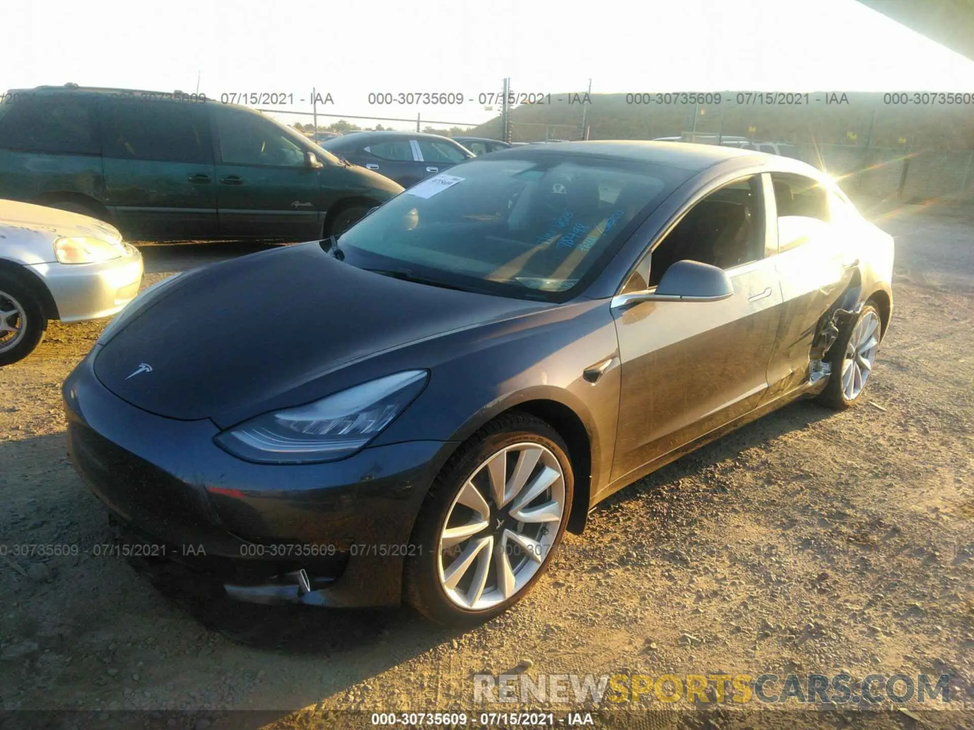 2 fotografías del automóvil dañado 5YJ3E1EBXLF795434 TESLA MODEL 3 2020