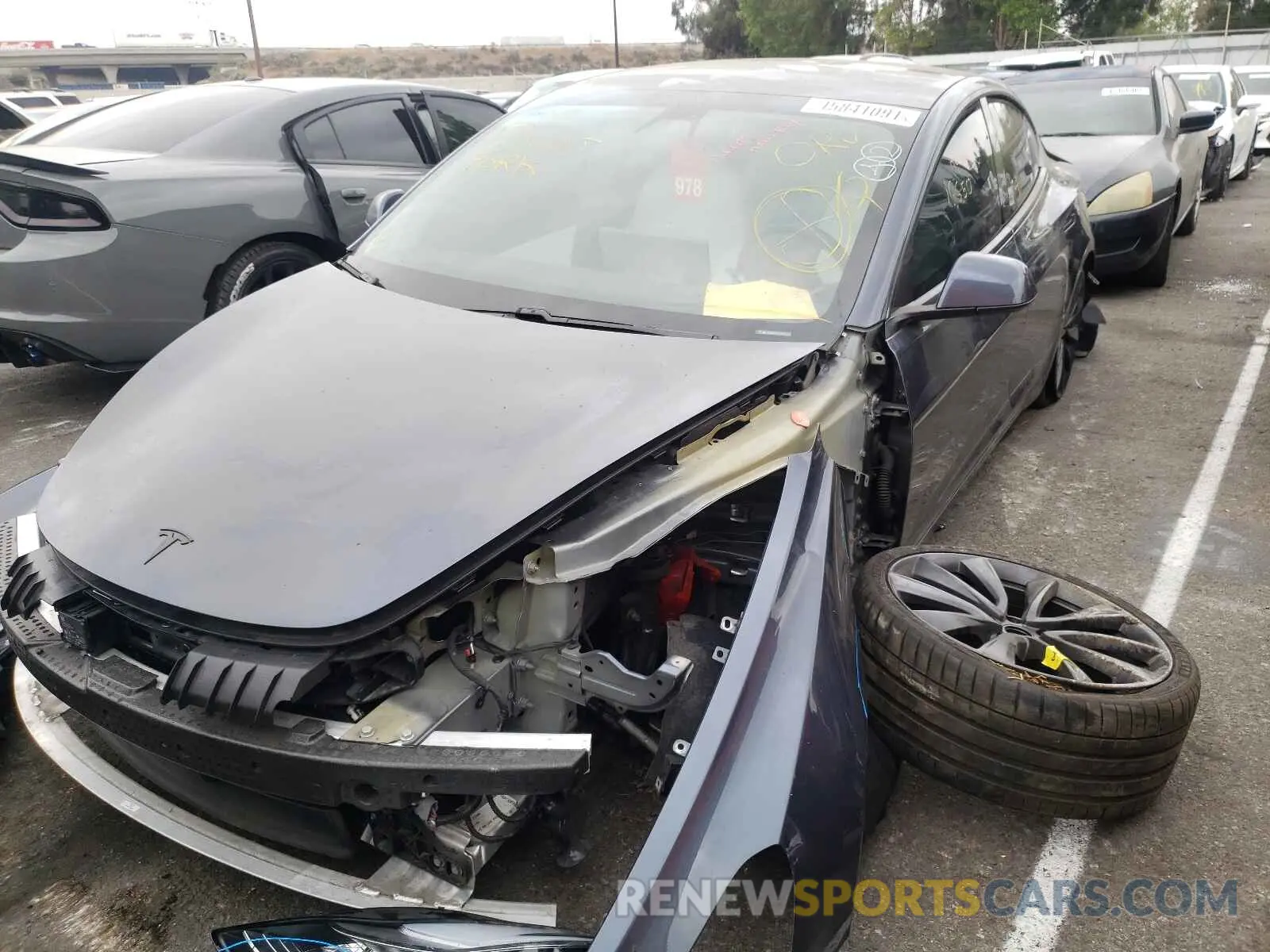 2 fotografías del automóvil dañado 5YJ3E1EC0LF642070 TESLA MODEL 3 2020