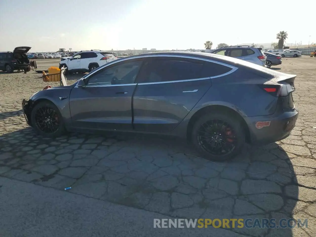 2 fotografías del automóvil dañado 5YJ3E1EC0LF714594 TESLA MODEL 3 2020
