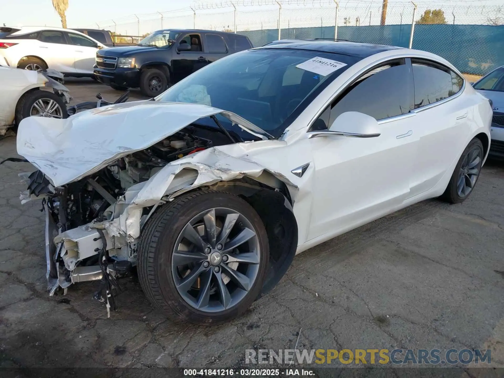2 fotografías del automóvil dañado 5YJ3E1EC1LF602516 TESLA MODEL 3 2020